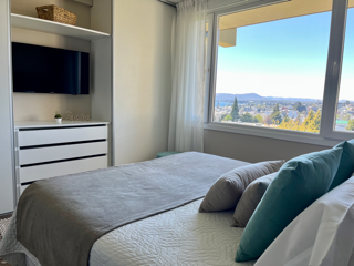 Alojamiento en el centro con vista parcial al lago y con cochera